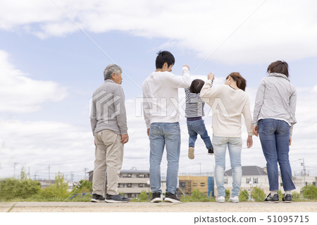 Back view of a three generation family Back view of a three generation family 51095715