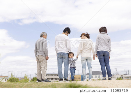 Back view of a three generation family 51095719
