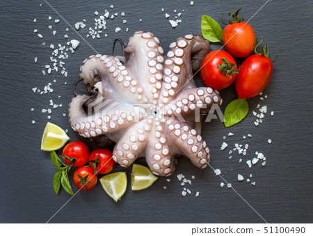Raw octopus with lime, tomatoes and basil Raw octopus with lime, tomatoes and basil 51100490