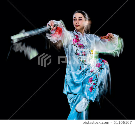 woman Tai Chi Chuan Tadjiquan posture isolated black background light painting  51106167