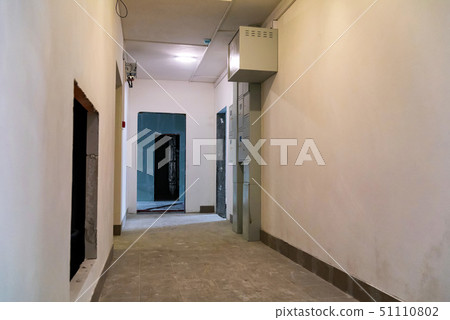 View of corridor of apartment building under construction View of corridor of apartment building under construction 51110802