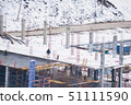 Top view snowy construction site with new appartment building 51111590