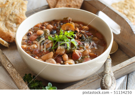 Cooked legumes and vegetables in a bowl 51134250