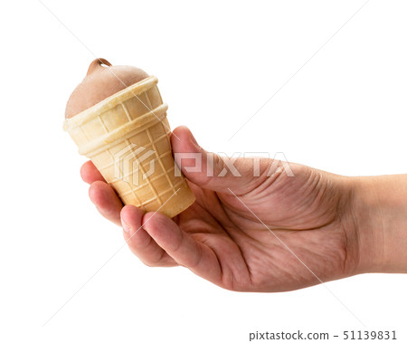 Chocolate ice cream in a waffle Cup holding the Chocolate ice cream in a waffle Cup holding the 51139831