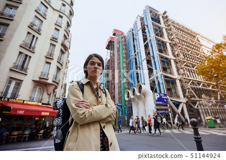 Young girl in front of the Pompidou Center in Paris 51144924