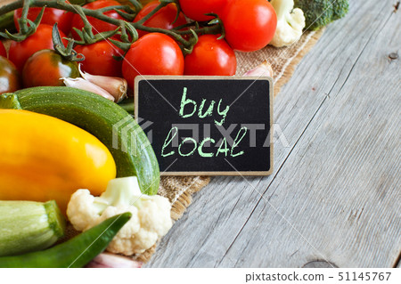 Fresh vegetables and small chalkboard Fresh vegetables and small chalkboard 51145767