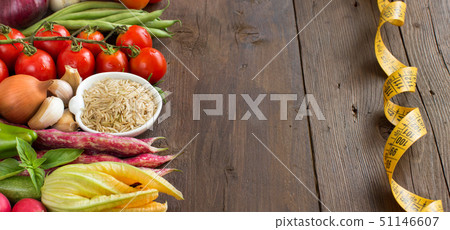 Unpolished raw rice and vegetables 51146607