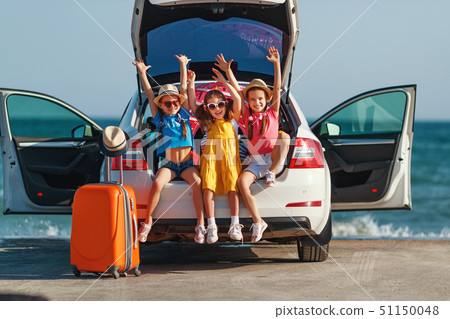 happy children girls friends sisters on the car happy children girls friends sisters on the car 51150048