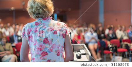 Female academic professor lecturing. Female academic professor lecturing. 51168978
