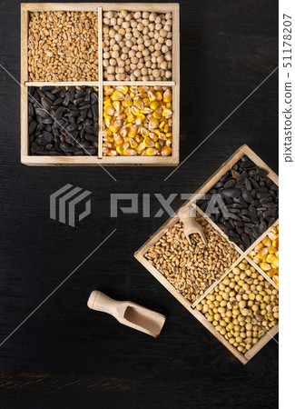 Small box with various grains and cereals on 51178207