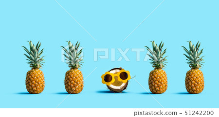 One out unique coconut with many pineapples One out unique coconut with many pineapples 51242200