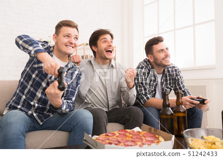 Avid Gamers. Friends Playing Video Games, Resting At Home 51242433