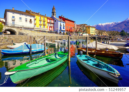 Colorful boats in olt town of Ascona, Switzerland 51249957