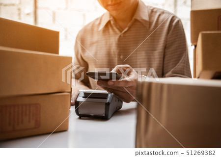 Man hand holding credit card reader nfc tecnology Man hand holding credit card reader nfc tecnology 51269382