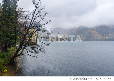 View of Lake Bled on rainy day. Slovenia View of Lake Bled on rainy day. Slovenia 51308866