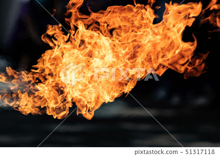 Closeup Fire flames from gas explosion on black Closeup Fire flames from gas explosion on black 51317118