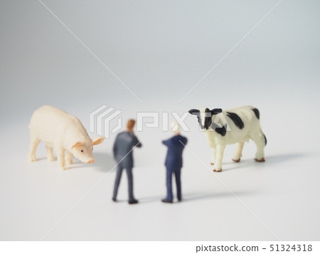 Pig and cow and two businessmen 51324318
