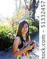 Happy joyful Asian smile mother fun care baby 51332457