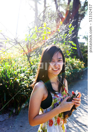 Happy joyful Asian smile mother fun care baby 51332457