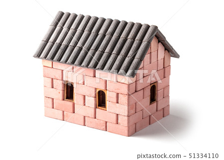 Brick house on a white background. Model toy at home Brick house on a white background. Model toy at home 51334110