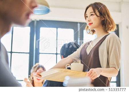 Female cafe clerk 51335777