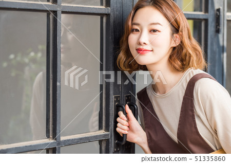 Female cafe clerk Female cafe clerk 51335860