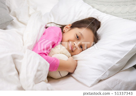 Cute little child girl sleeping with teddy bear Cute little child girl sleeping with teddy bear 51337343