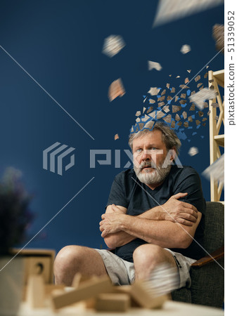 Old bearded man with alzheimer desease 51339052