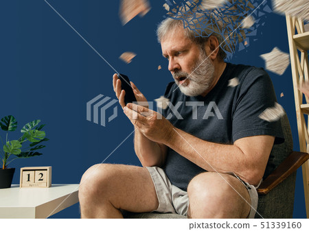 Old bearded man with alzheimer desease 51339160