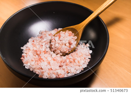 Pink salt from Bolivian in a black bowl 51340673