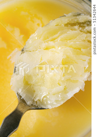 Melted ghee butter 51342644