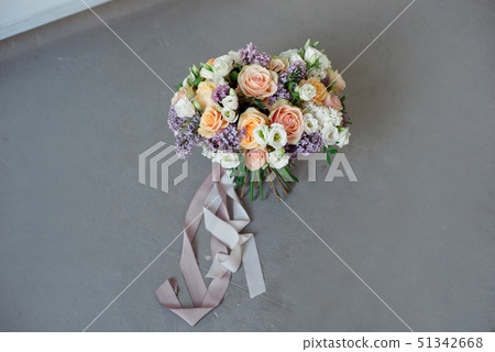 Close-up bouquet of flowers on the round white table indoors. 51342668