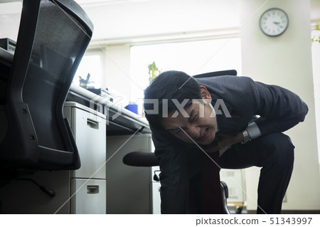 Businessman falling down at work Businessman falling down at work 51343997