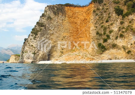 The rocks over the transparent ocean water. Montenegro 51347079
