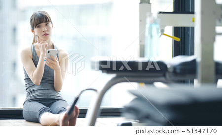 Woman using smartphone 51347170