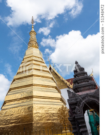 The golden pagoda in the traditional northern Thai The golden pagoda in the traditional northern Thai 51348472