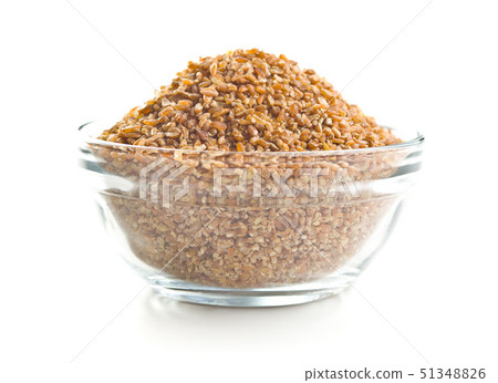 Dry bulgur wheat grains. Dry bulgur wheat grains. 51348826