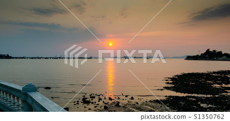 Sunset sky with island with low tide of sea 51350762