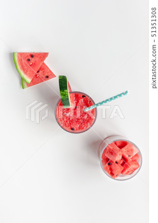 Watermelon smoothie with crushed fruits in glasses 51351308