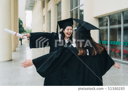friend smiling walking close open arms hugging 51380285