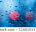 Water droplet on window with blurred background 51481013
