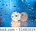 Water droplet on window with blurred background 51481019