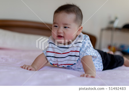 A lying baby 51492483