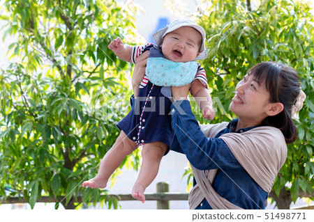 Parents and children enjoying in fresh green 51498771
