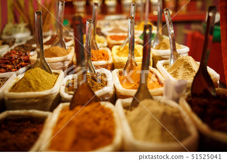 Colorful spices in bags at a market in Goa 51525041
