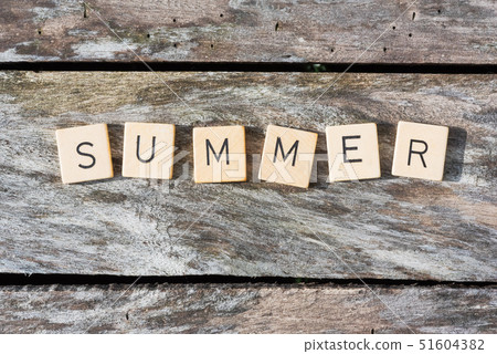Summer letters on a wood table Summer letters on a wood table 51604382