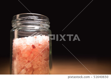 Pink salt from Bolivian in a glass jar close up 51640650
