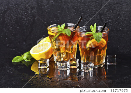 Two glasses with cold traditional iced tea with Two glasses with cold traditional iced tea with 51717975