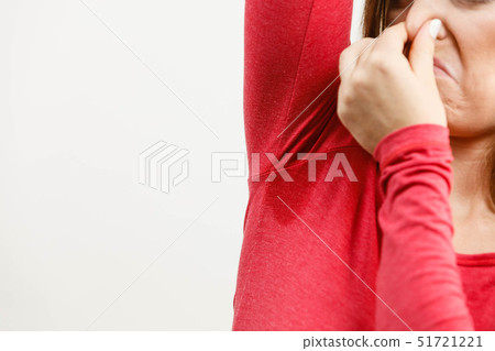 Woman sweating very badly have wet armpit 51721221