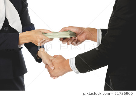 Businessmen making handshake with money in hands Businessmen making handshake with money in hands 51726960